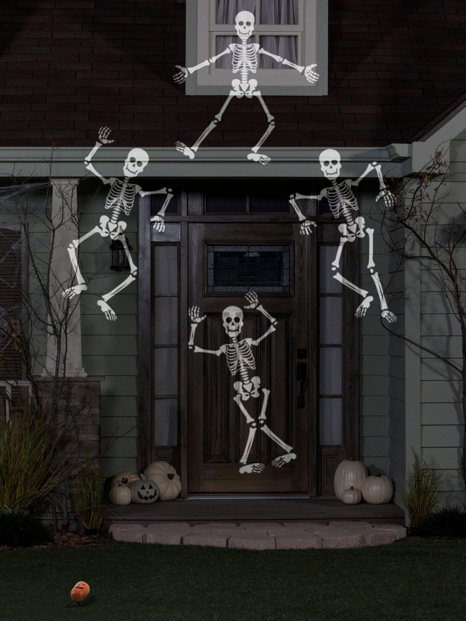 Whirling Skeletons Spotlight Projection - costumes.com